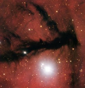 裂け目から向こうの星々が見えているような茜色の領域