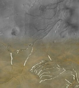 火星に数多く存在する谷、氷床の下の水流によって形成された可能性