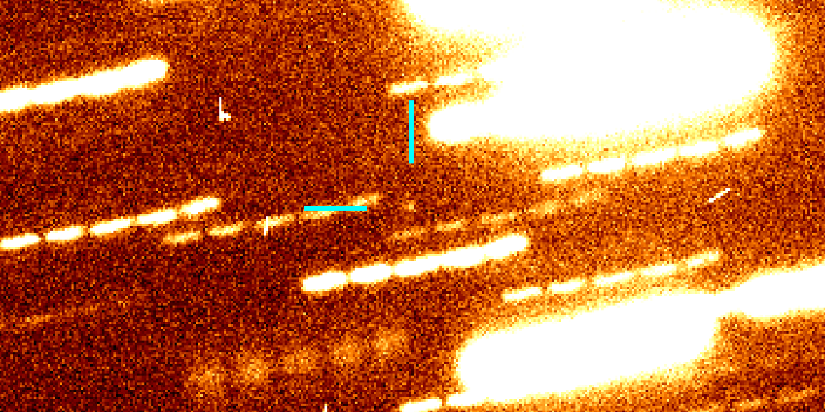 すばる望遠鏡が撮影した小惑星「1998 KY26」（水色の線で示された中央の光点）（Credit: 国立天文台）