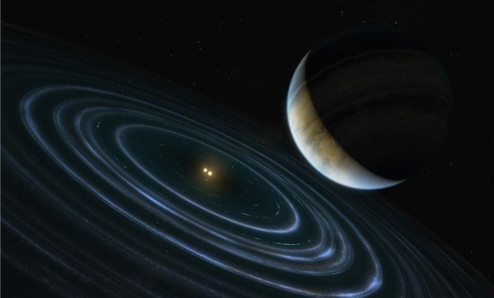 HD106906bの想像図(Credit: NASA, ESA, and M. Kornmesser (ESA/Hubble))