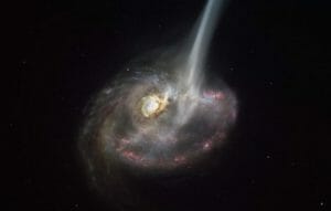 大量のガスを失いつつある遠方銀河を発見、銀河どうしの衝突が原因か