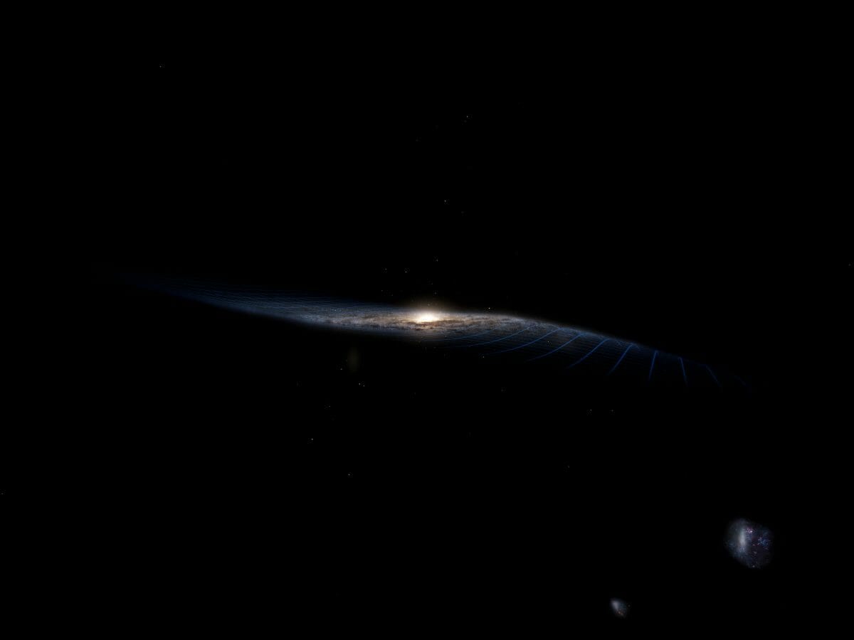 片側が上に、片側が下に歪んだ天の川銀河を描いた想像図。右下に見えているのは伴銀河の大マゼラン雲と小マゼラン雲（Credit: Stefan Payne-Wardenaar; Magellanic Clouds: Robert Gendler/ESO）