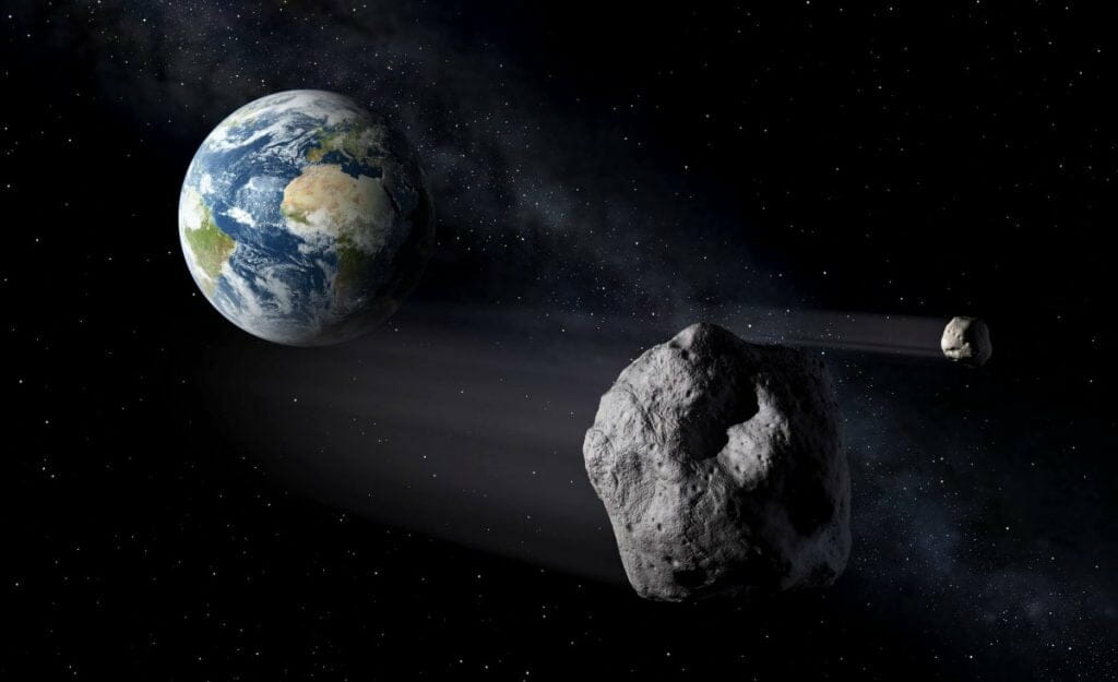 地球をかすめる小惑星を描いた想像図（Credit: ESA – P.Carril）
