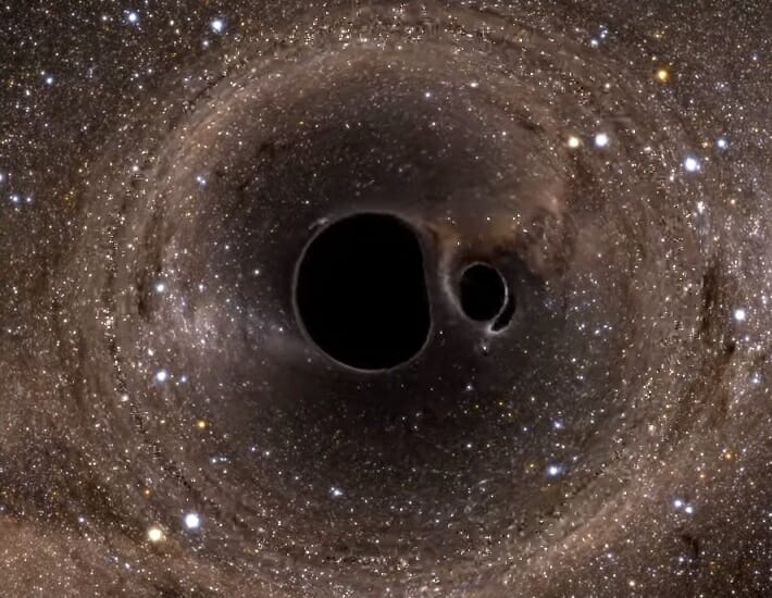 連星ブラックホールの衝突と合体は、宇宙の果てを舞台にしたダンスのよう