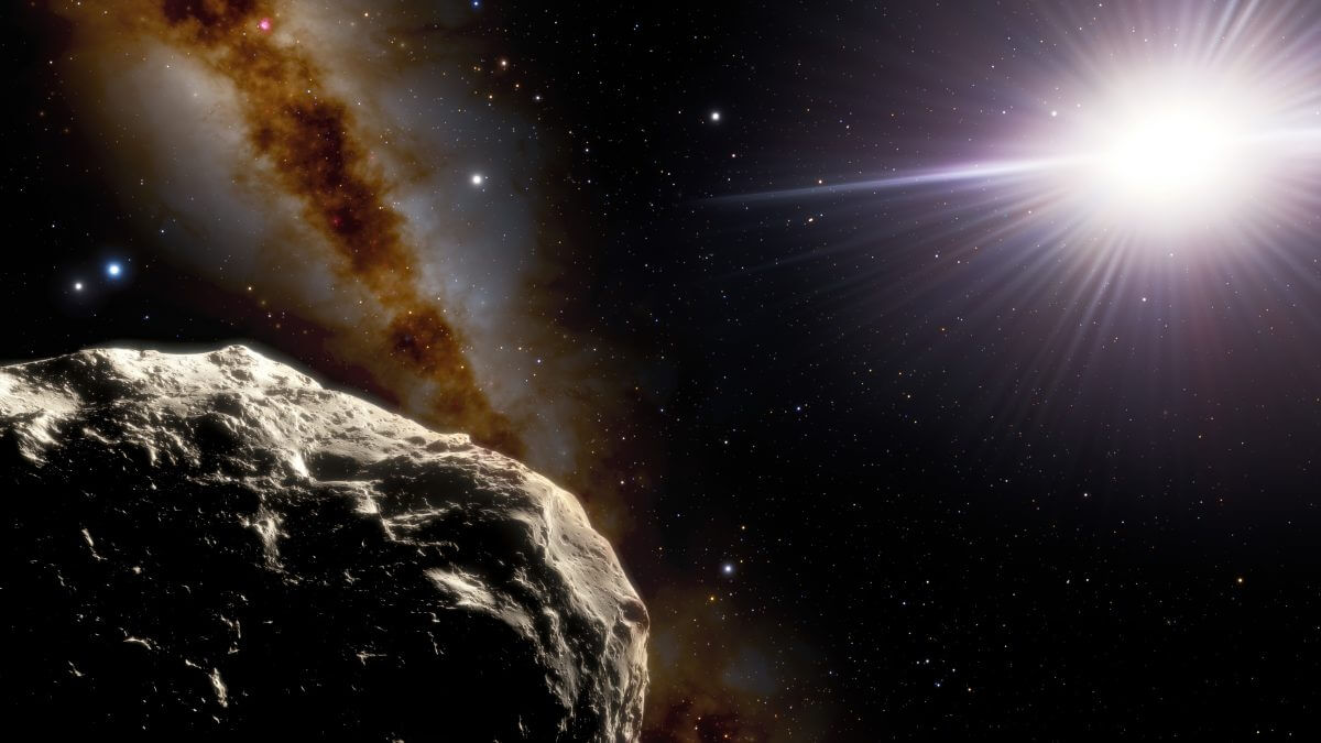 地球のトロヤ群小惑星「2020 XL5」（左下）の想像図。小惑星のすぐ上には地球と月が、画像右上には太陽が描かれている（Credit: NOIRLab/NSF/AURA/J. da Silva/Spaceengine; Acknowledgment: M. Zamani (NSF’s NOIRLab)）