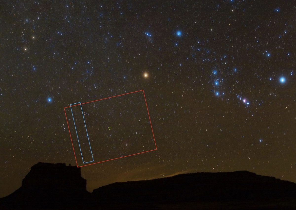 ルーシーの機器指向台がオリオン座の近くに向けられたことを示した画像で、T2CAMのフィールドにはバラ星雲が含まれています。赤、青、黄の枠は、それぞれT2CAM、MVIC、L'LORRIの画像のフレームを示しています。（Credit：SwRI; 2008 file photo of night sky as seen over Fajada Butte in New Mexico, courtesy National Parks Service）