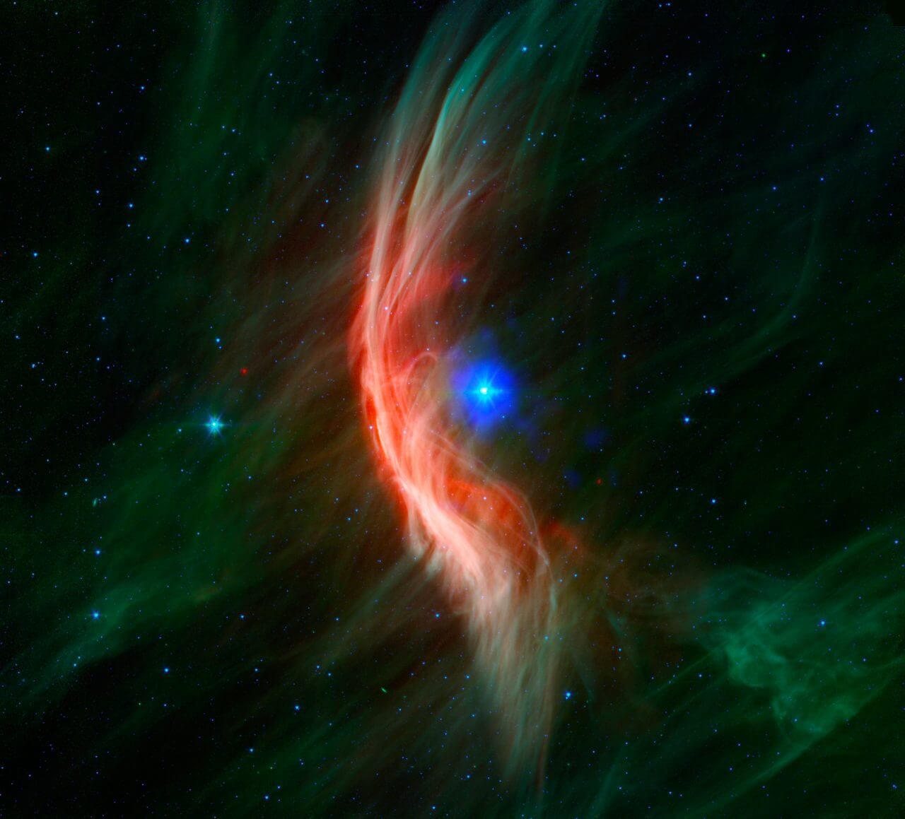 【▲ 「へびつかい座ゼータ星」とバウショック（弧状衝撃波）（Credit: X-ray: NASA/CXC/Dublin Inst. Advanced Studies/S. Green et al.; Infrared: NASA/JPL/Spitzer）】