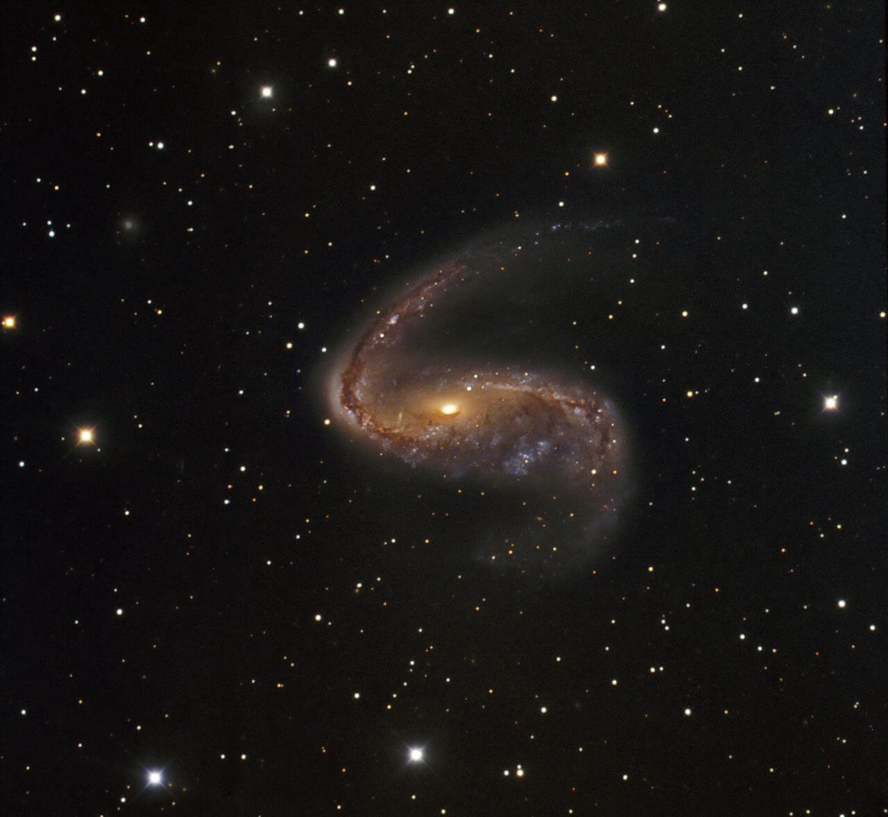 【▲ ラ・シヤ天文台のデンマークの1.54m望遠鏡で撮影された渦巻銀河「NGC 2442」。2009年12月公開（Credit: ESO/IDA/Danish 1.5 m/R. Gendler, J.-E. Ovaldsen, C. C. Thöne and C. Féron）】