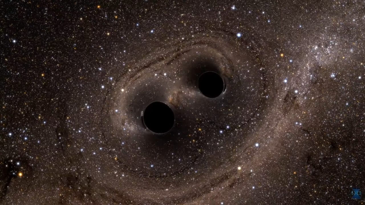 【▲ 図1: お互いの周りを公転している2個のブラックホールの想像図。 (Image Credit: SXS) 】