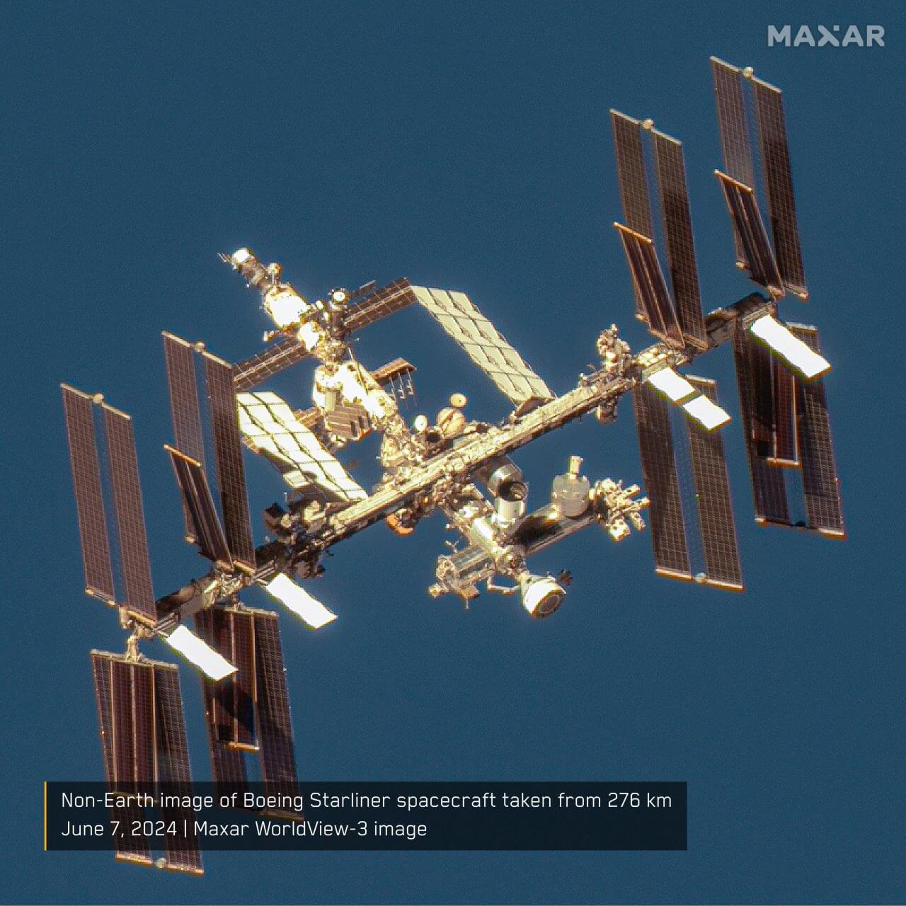 【▲ Maxarが撮影・公開した国際宇宙ステーション（ISS）の画像。ISSの前方にあたる画像中央右下の「Harmony（ハーモニー）」モジュールにBoeing（ボーイング）の新型有人宇宙船「Starliner（スターライナー）」が係留されている様子が確認できる（Credit: Maxar Technologies）】