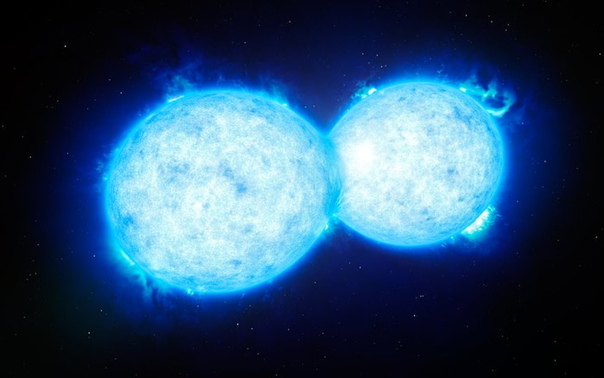 【▲ 図2: 合体しつつある2つの恒星の想像図。藤井准教授らの研究は、球状星団の中でこのような現象が連続して起こり、非常に巨大な恒星が誕生した可能性を示している。（Credit: ESO/L. Calçada）】