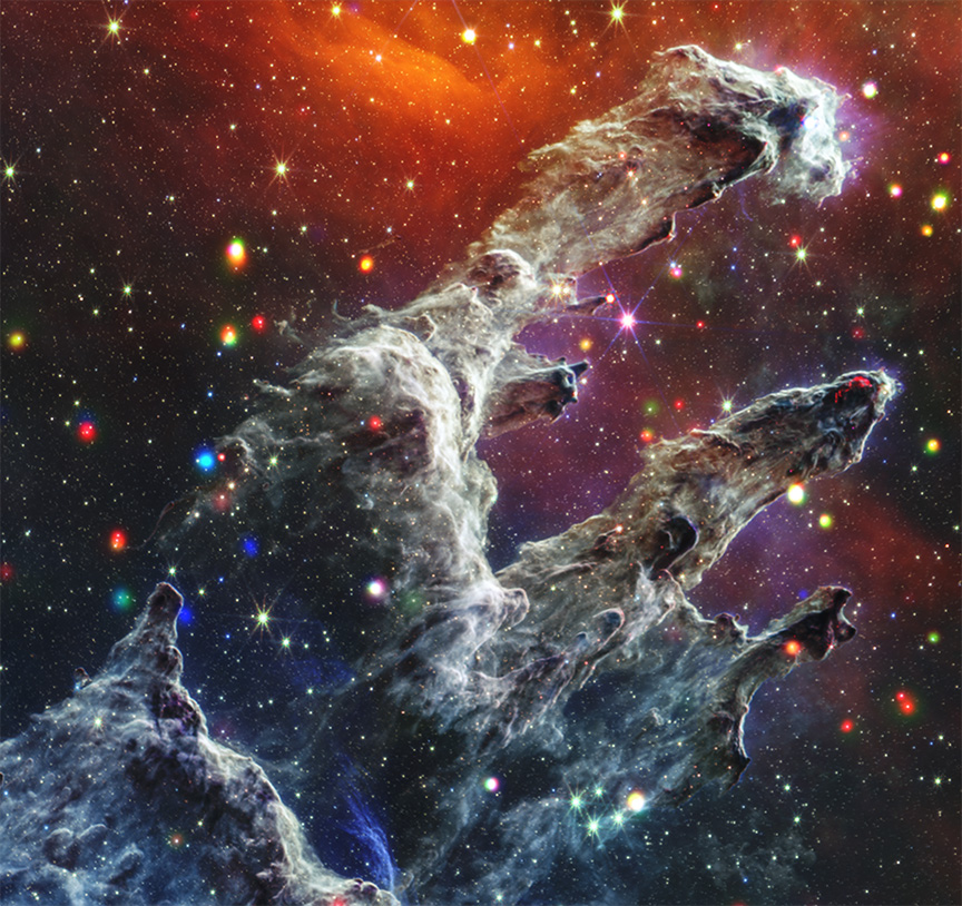 The Eagle Nebula's “Pillar of Creation” seen in X-rays and infrared from images celebrating the 25th anniversary of the Chandra Gateway to the Universe