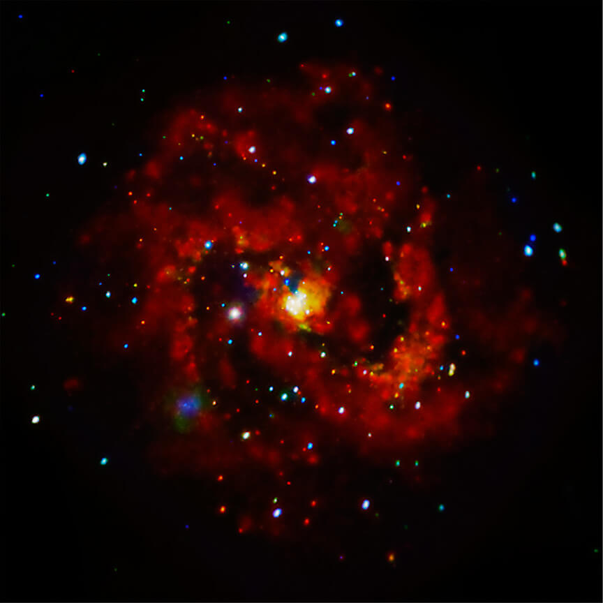 渦巻銀河「M83」。チャンドラX線宇宙望遠鏡(Chandra)の観測データを使用して作成(Credit: X-ray: NASA/CXC/SAO; Optical: NASA/ESA/AURA/STScI, Hubble Heritage Team, W. Blair (STScI/Johns Hopkins University) and R. O'Connell (University of Virginia); Image Processing: NASA/CXC/SAO/L. Frattare)