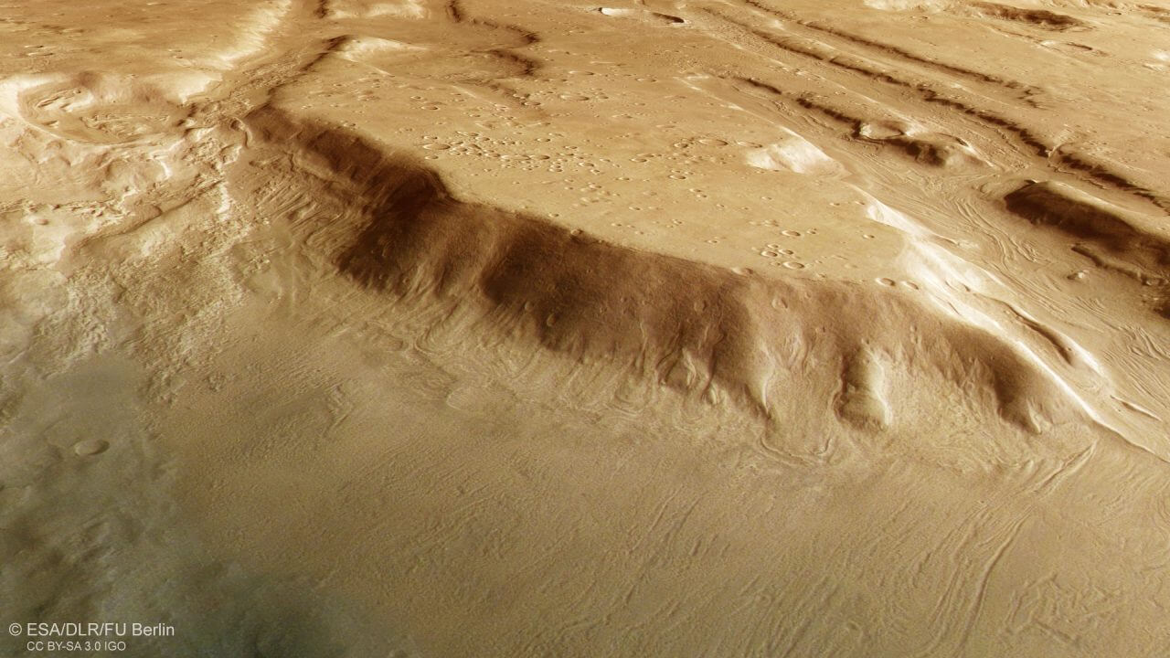 火星探査機「Mars Express」の高解像度ステレオカメラ「HRSC」で取得したデータを使って作成されたコロエ地溝帯(Coloe Fossae)の鳥瞰図(Credit: ESA/DLR/FU Berlin)