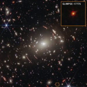 初期宇宙の「小さな赤い点」の正体は? 分厚いガスに包まれた巨大なブラックホールか