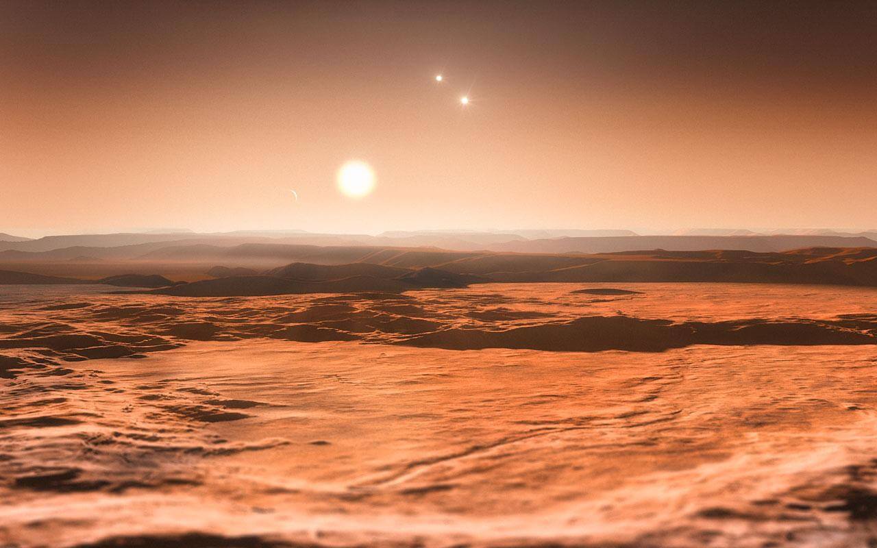 三重連星の赤色矮星を周回する系外惑星「グリーゼ667Cd」から見上げた空