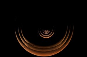 NASA小惑星探査機「Psyche」がスイングバイ時に撮影した三日月形の火星