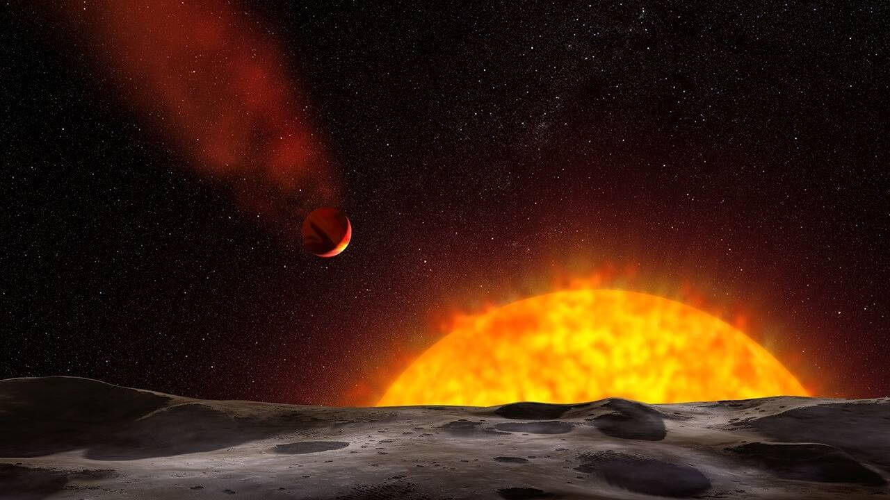 彗星のような尾を引く惑星「HD 209458b」の想像図