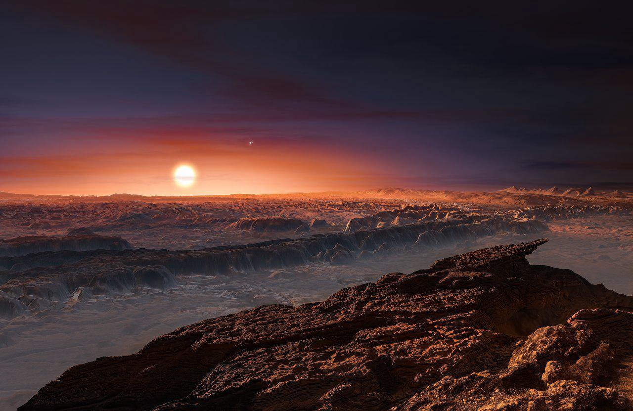 淡く赤い点を探して 最も近い系外惑星「プロキシマ・ケンタウリb」の地表を描いた想像図