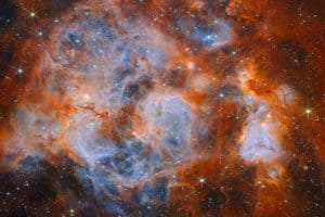 東西で段階が異なる星形成領域 ウェッブ宇宙望遠鏡が観測した大マゼラン雲の「N159」